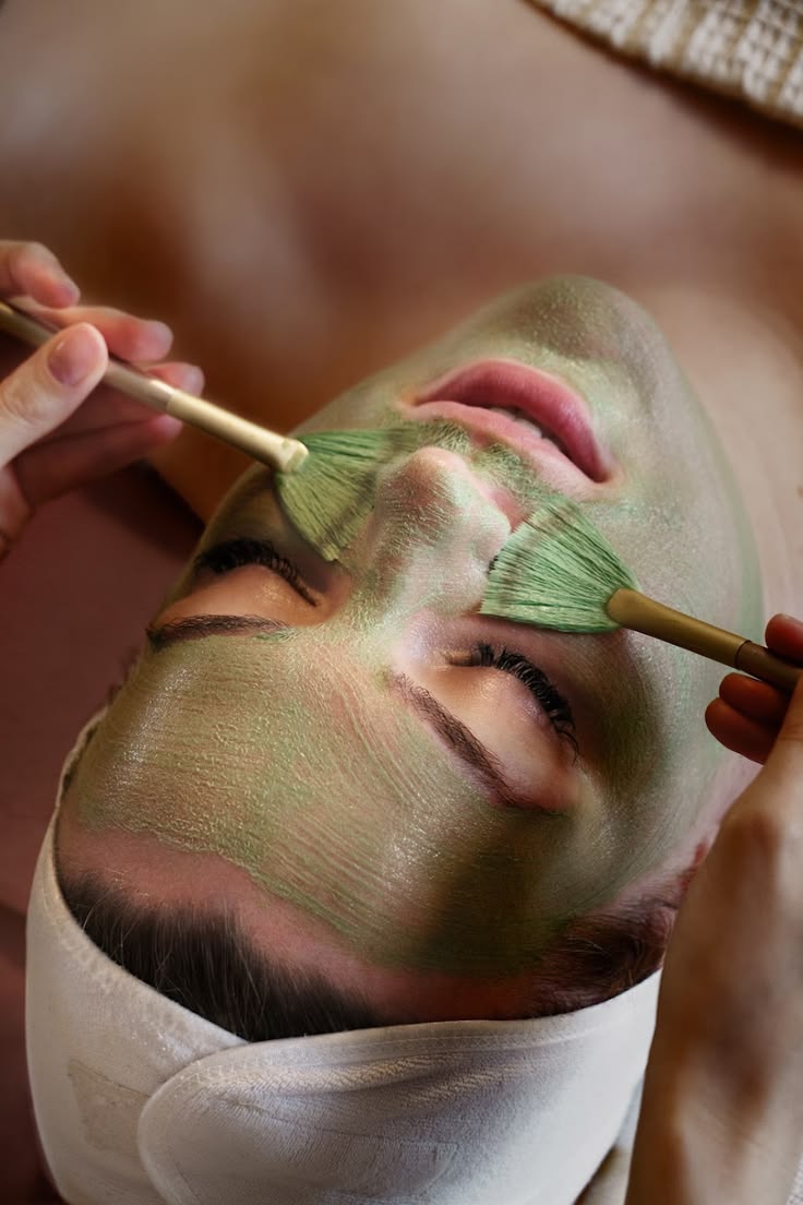 Woman receiving a facial treatment